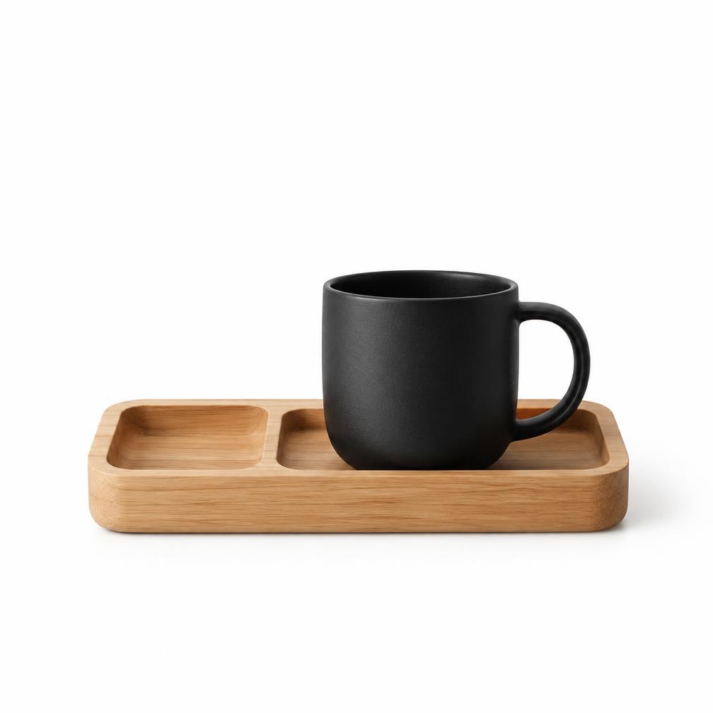 Black ceramic mug on a wooden serving tray